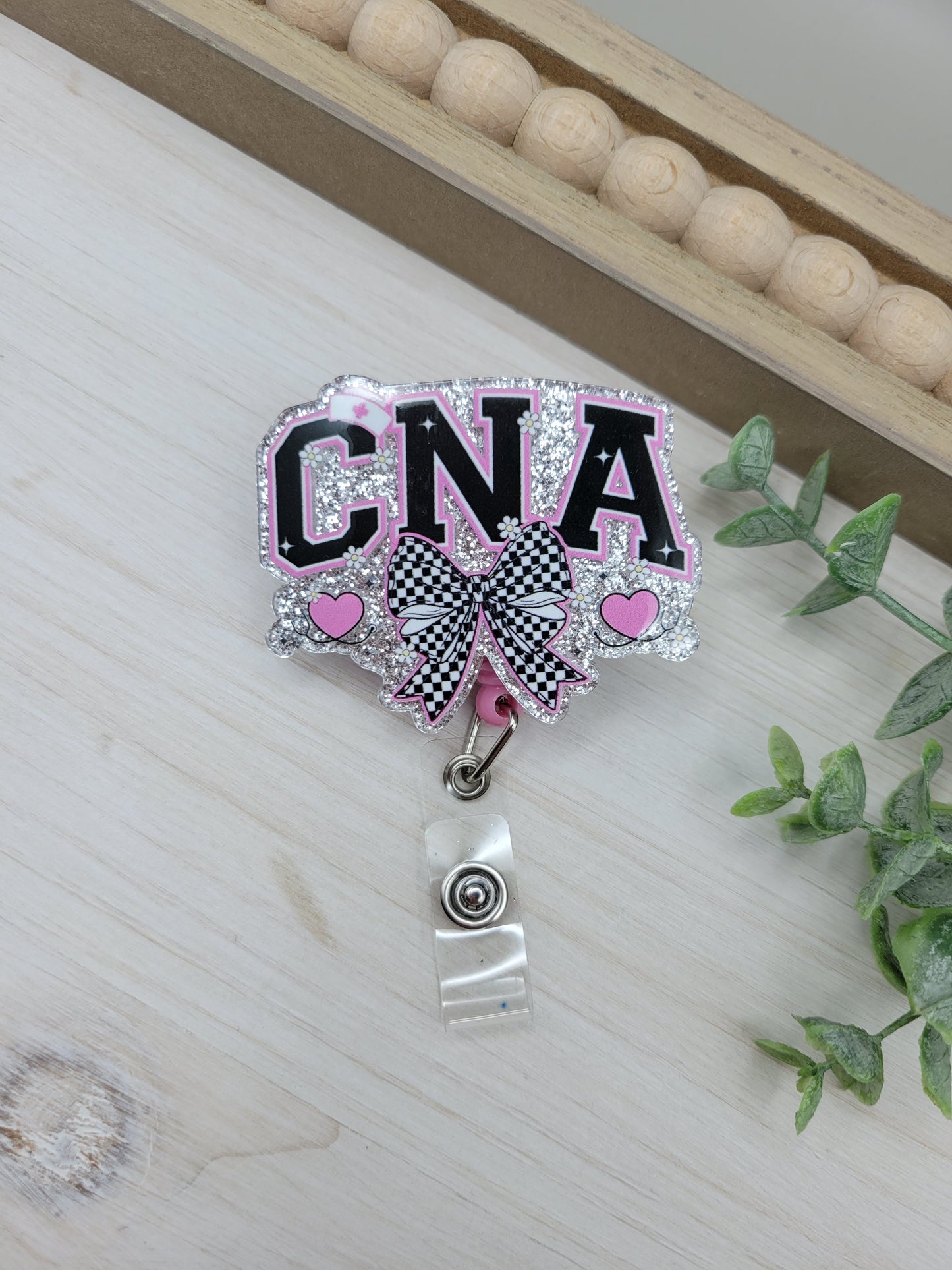 CNA Bow Badge Reel
