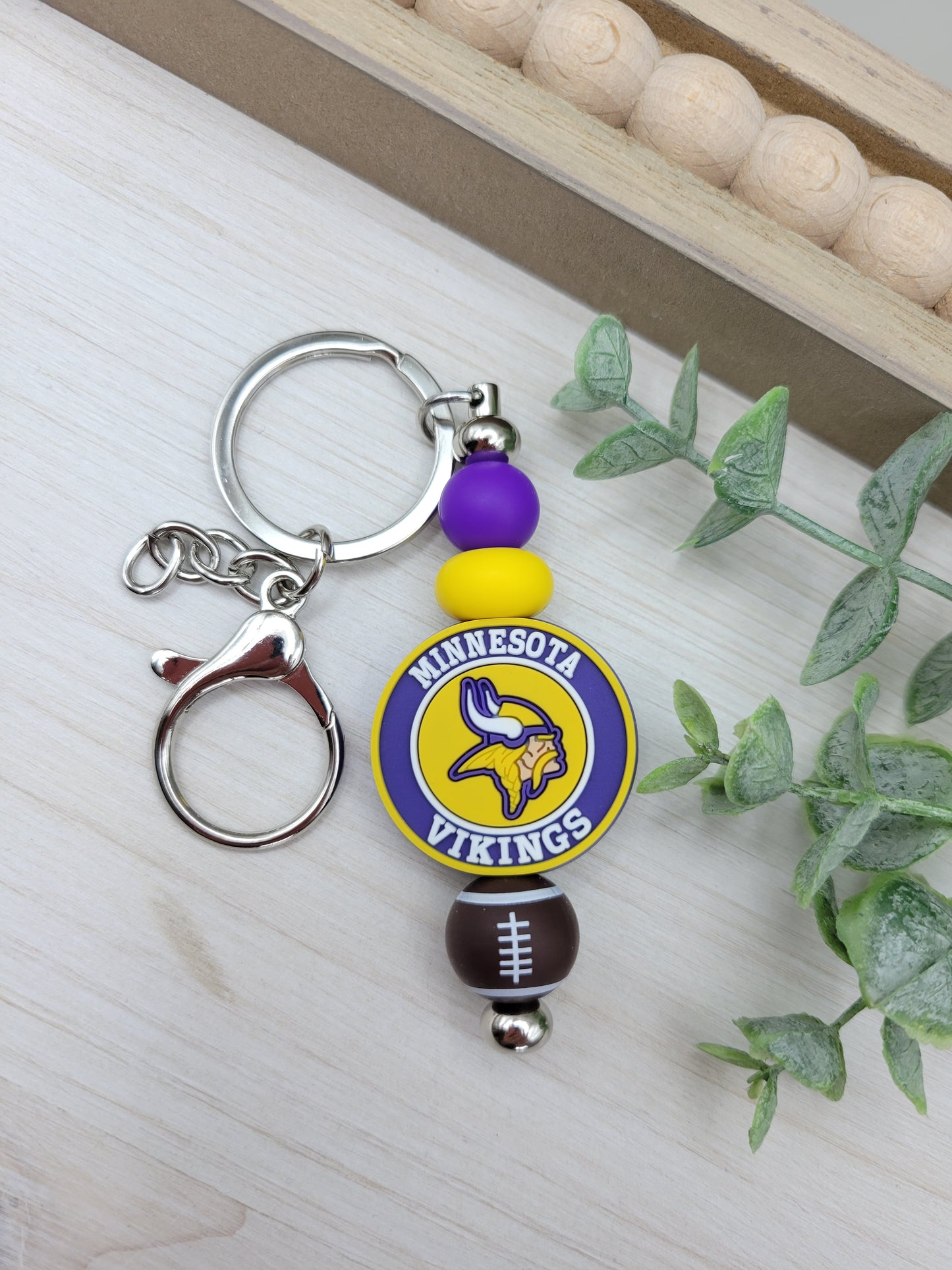 Round MN Football Barbell Keychain