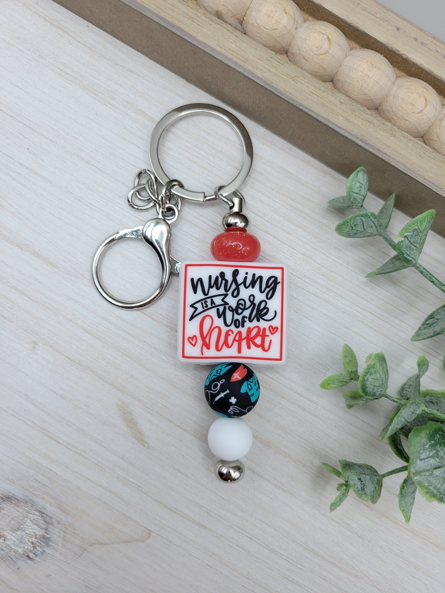 Nursing is a Work of Heart Barbell Keychain