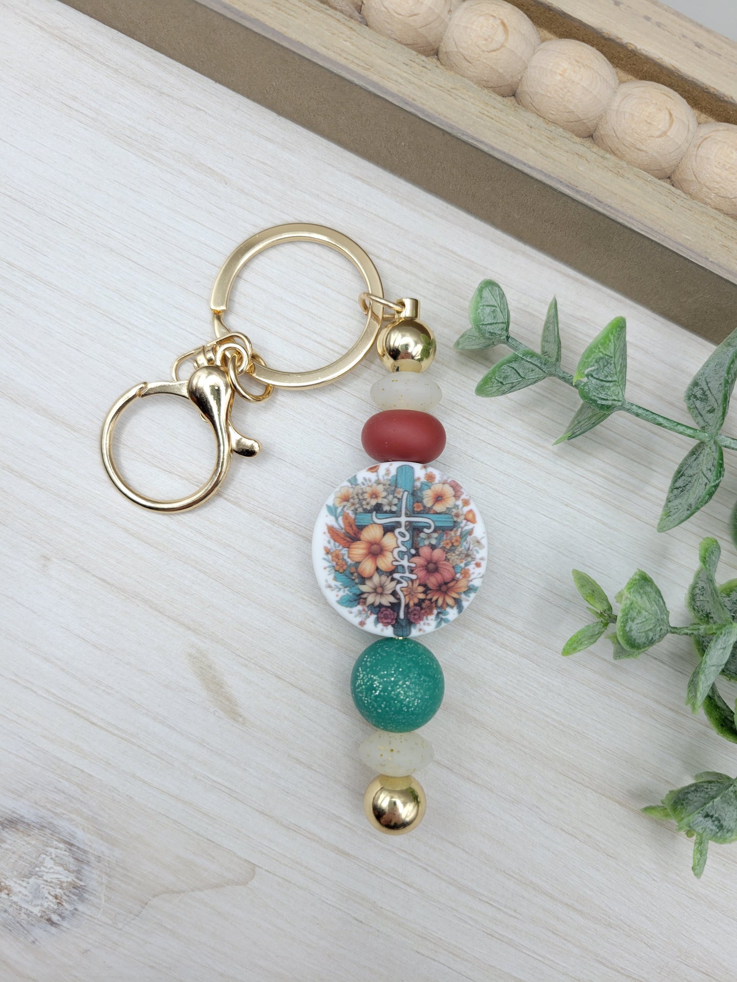 Round Floral Cross Barbell Keychain