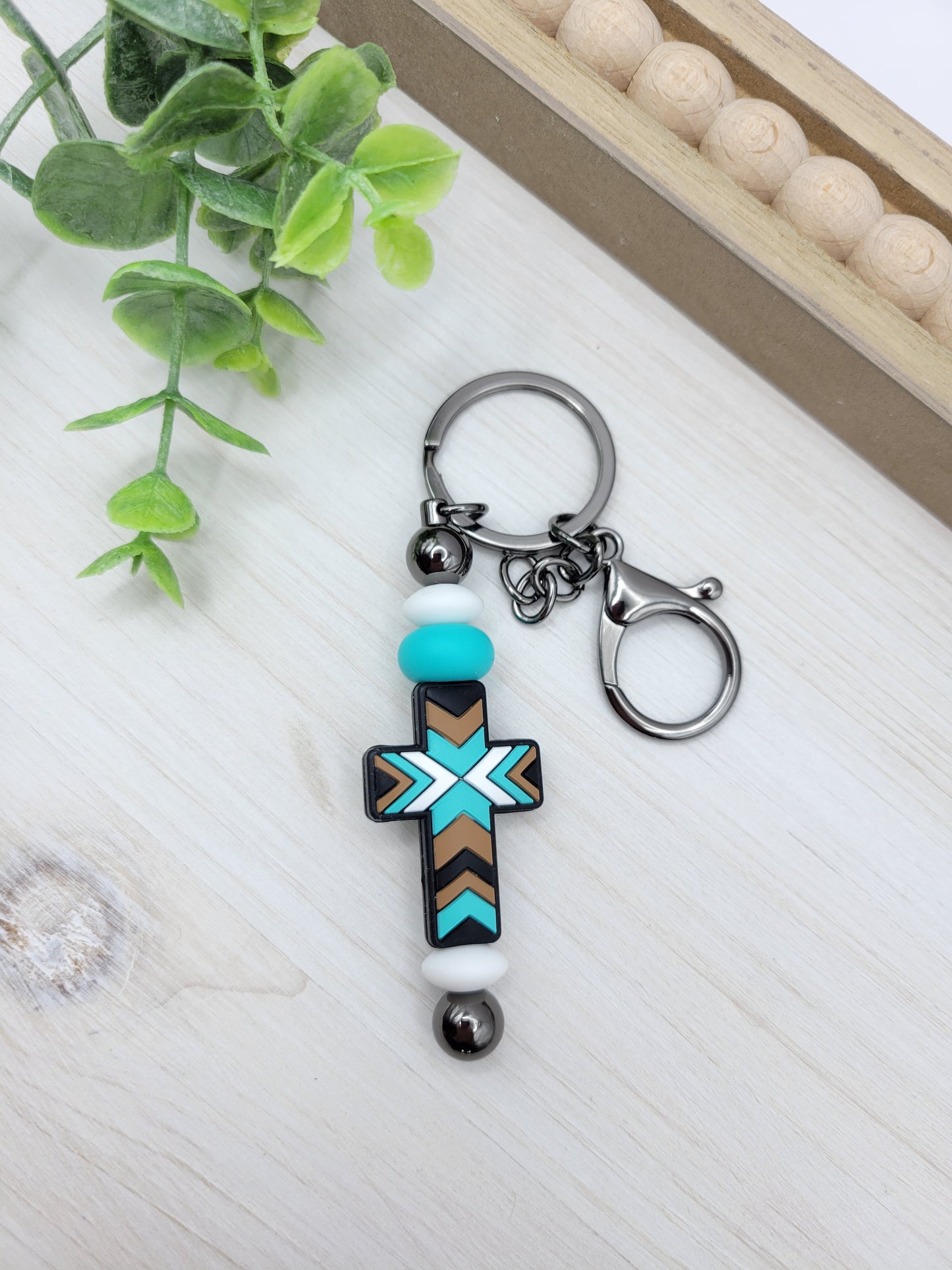 Tan/Teal Cross Barbell Keychain