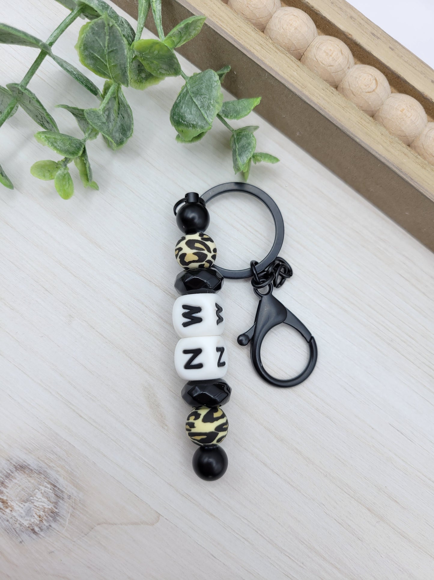 Leopard MN Barbell Keychain