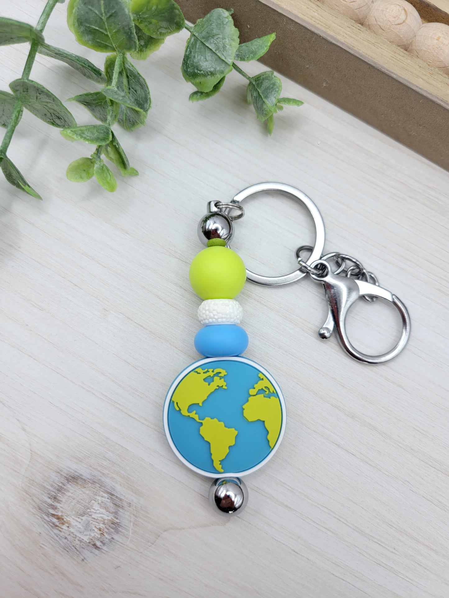 Globe Barbell Keychain