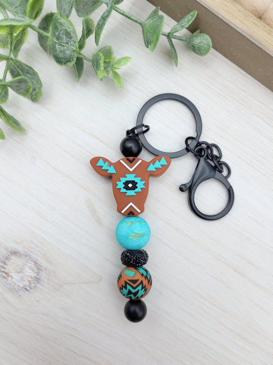 Rust Aztec Cow Barbell Keychain