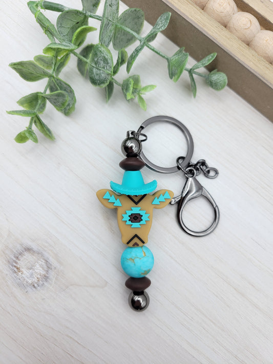 Aztec Cow w/ Teal Hat Barbell Keychain