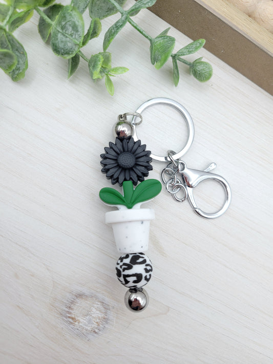 Potted Black Daisy Barbell Keychain