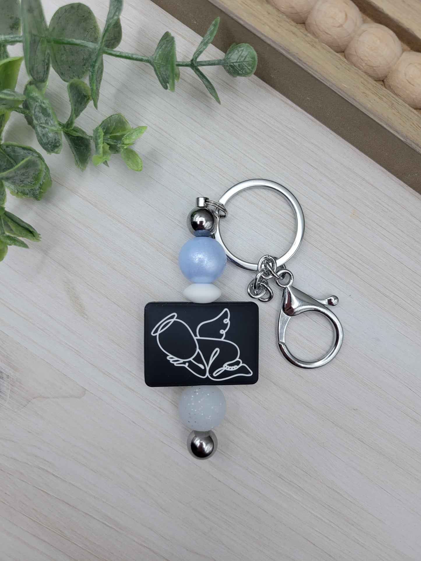 Black Carried for a Moment Barbell Keychain (double sided)