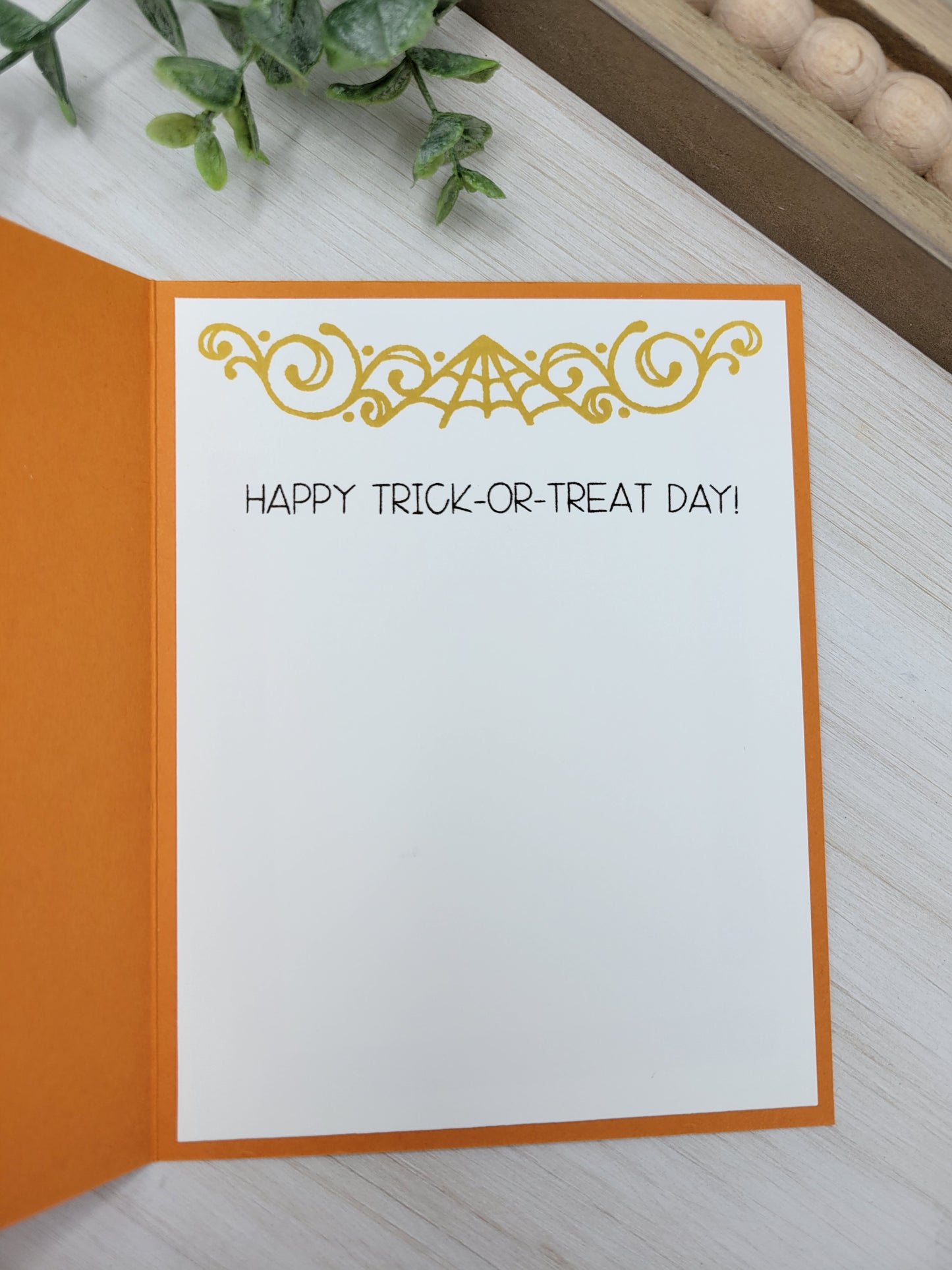 Plaid Pumpkin Halloween Greeting Card