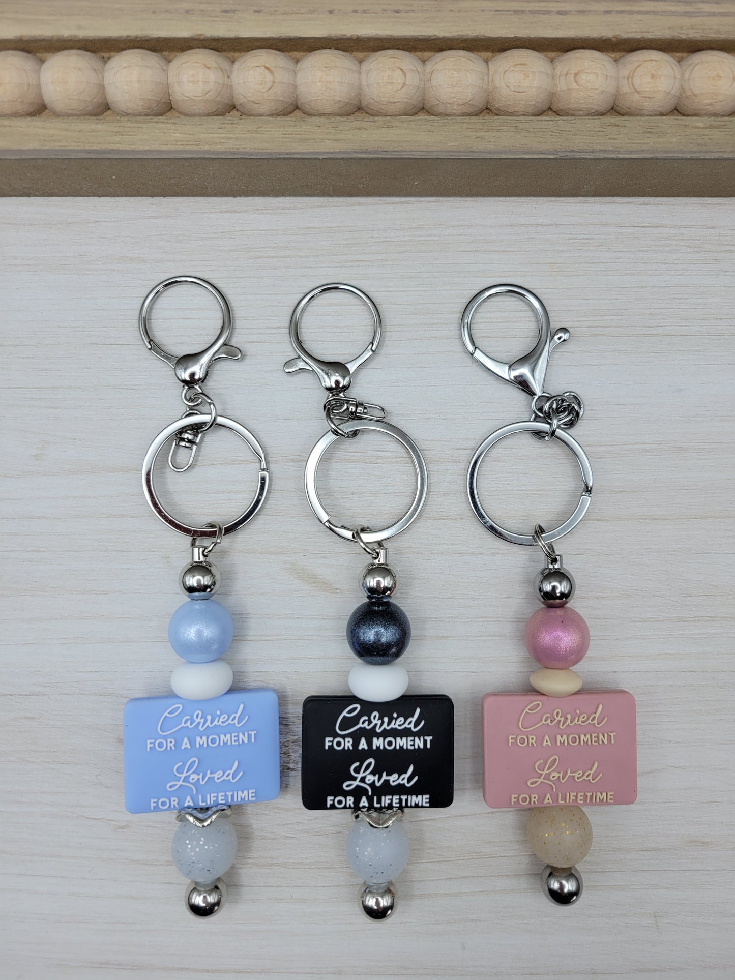 Carried for a Moment Barbell Keychain