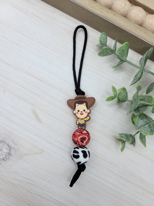 Toy Cowboy Zipper Pull