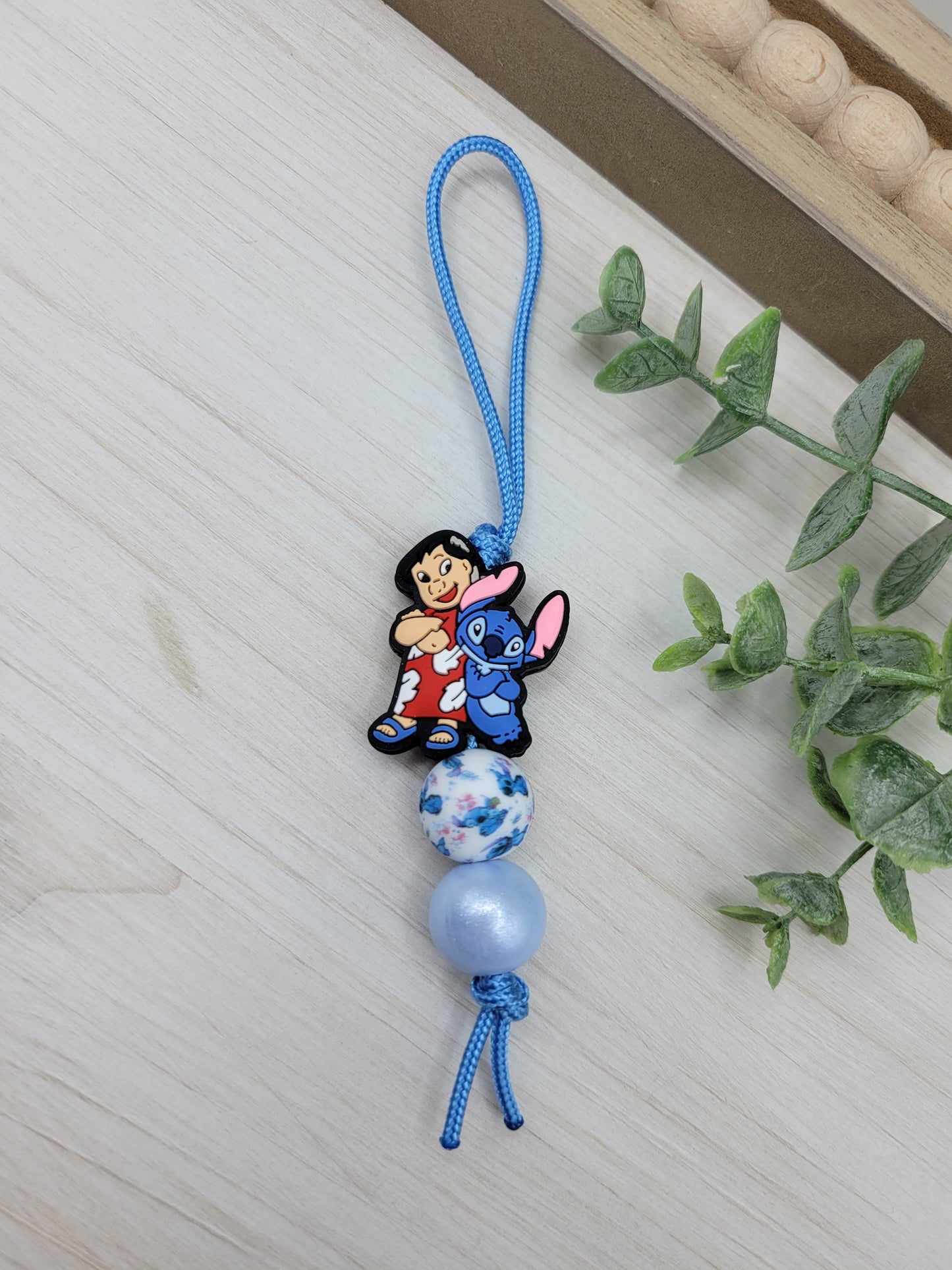 Blue Alien & Girl Zipper Pull