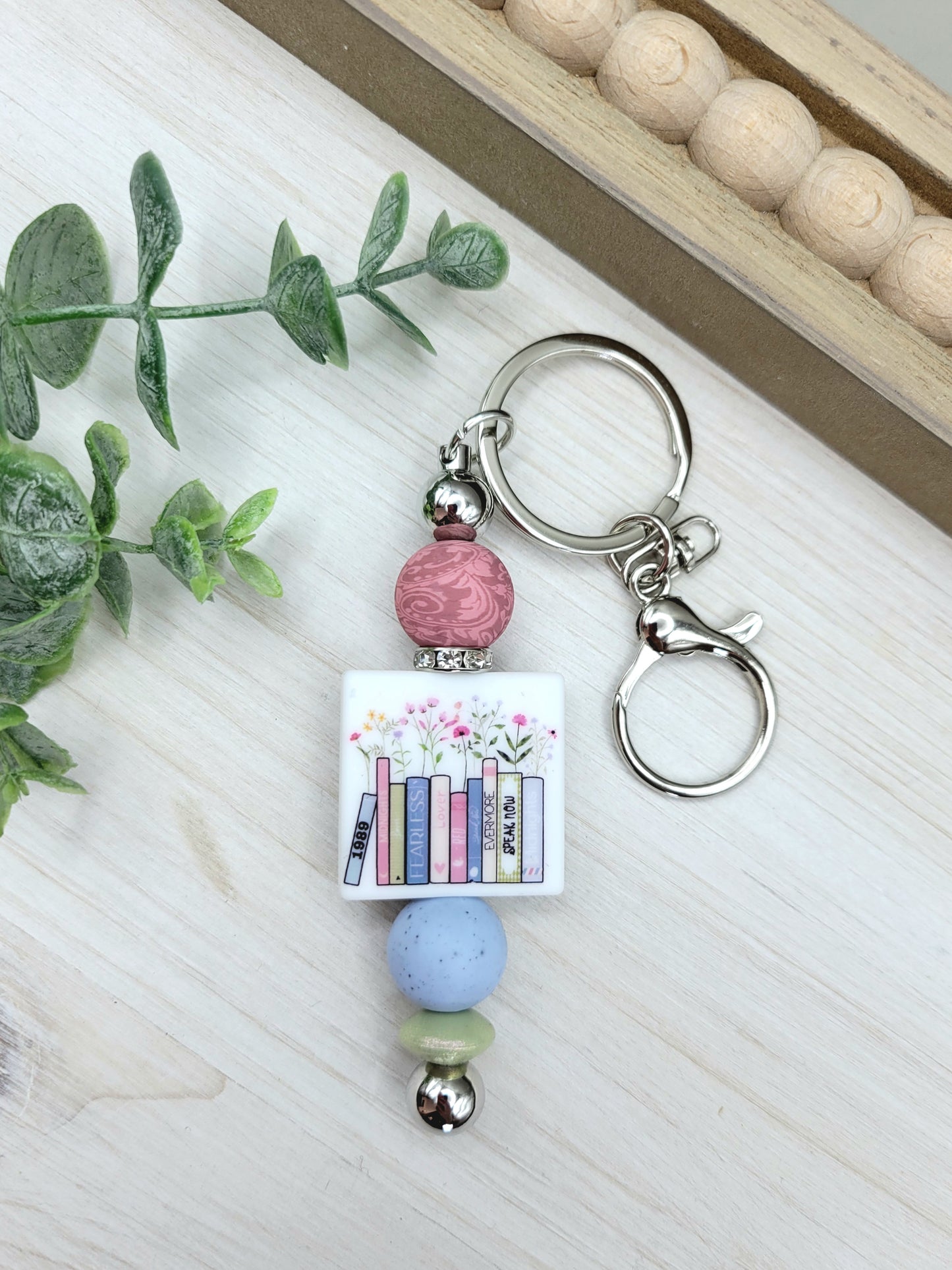 T.S. Albums Barbell Keychain