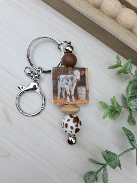Calf in Barn Barbell Keychain