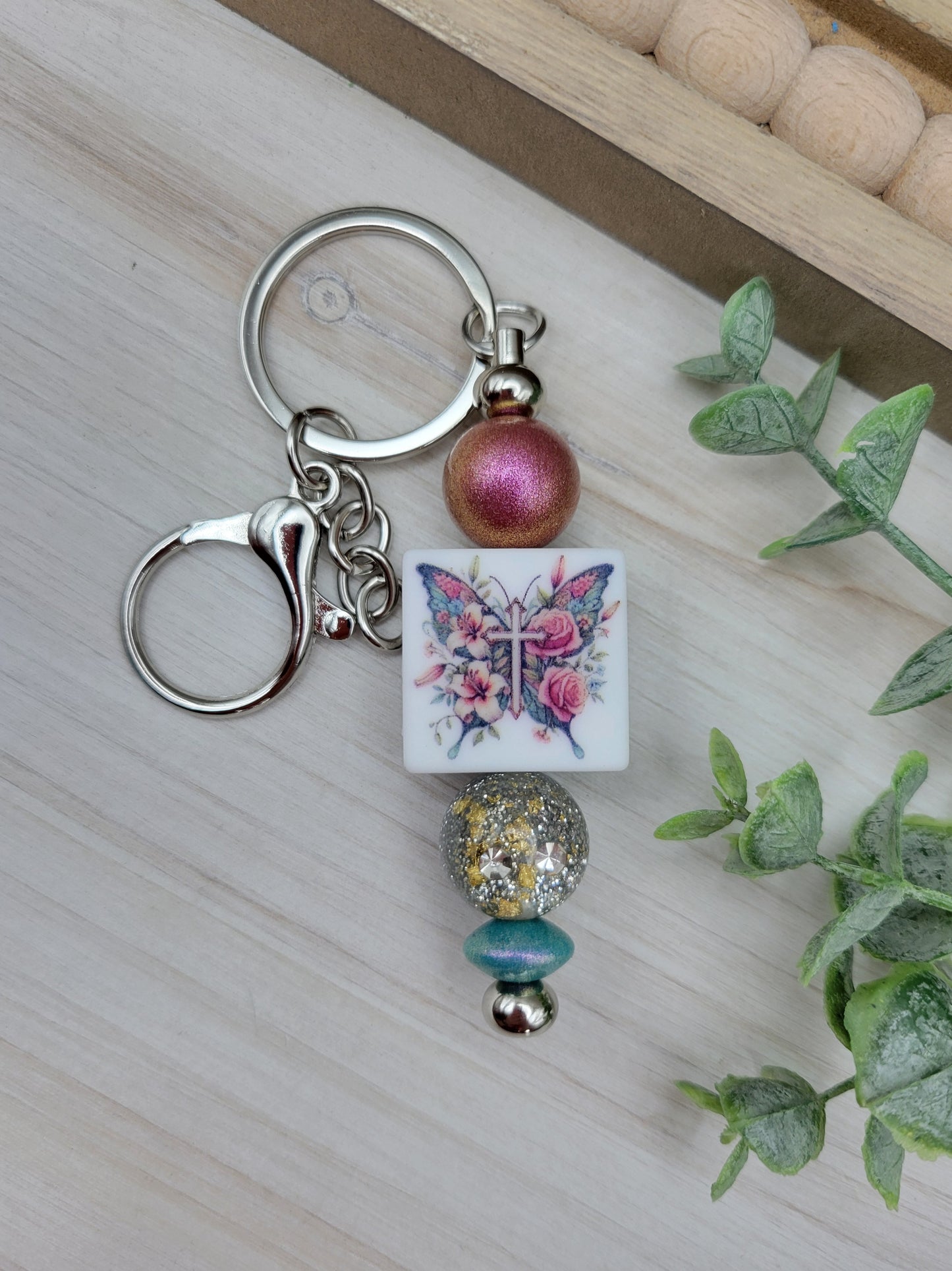Butterfly Cross Barbell Keychain