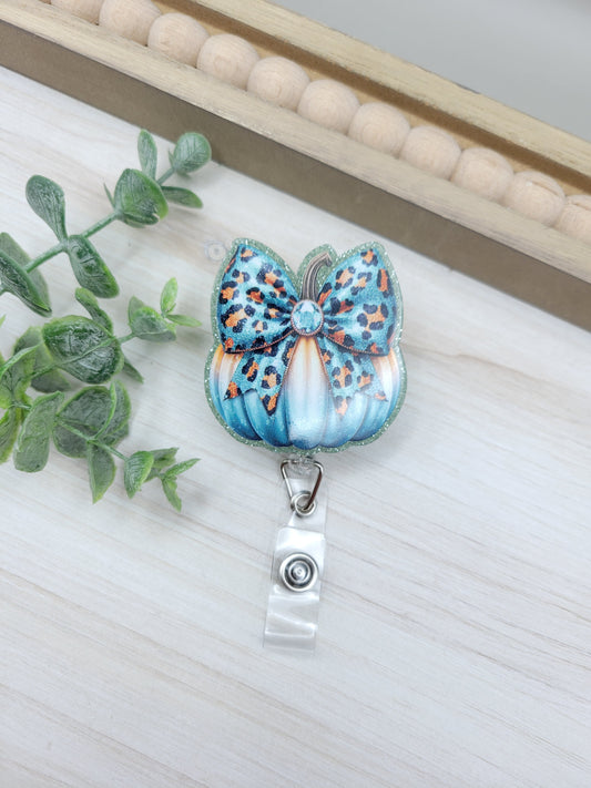 Teal Pumpkin w/ Bow Badge Reel