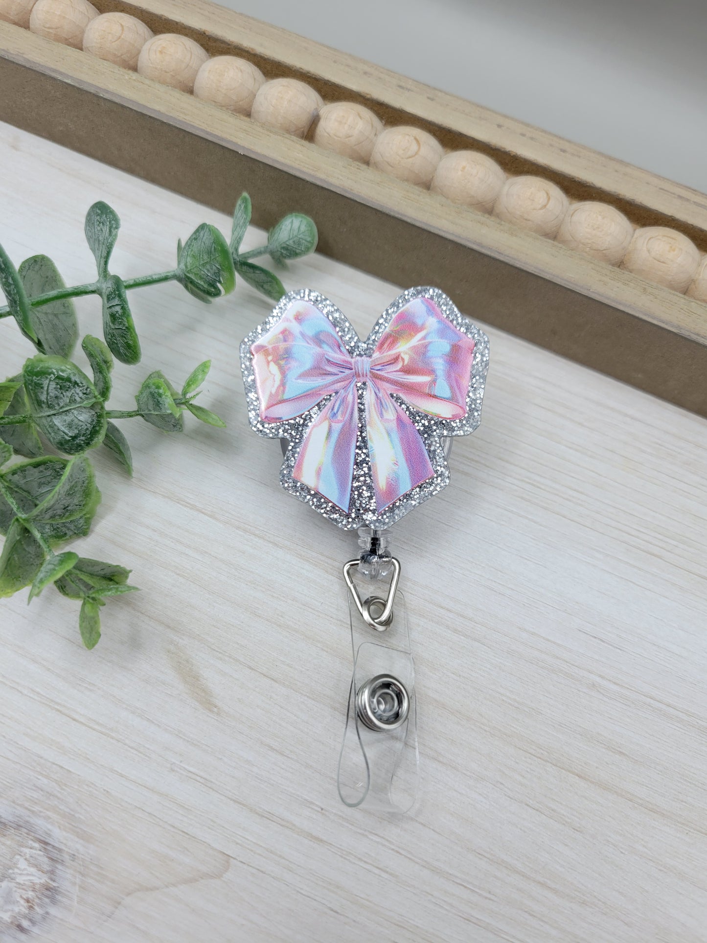 Holographic Pink Bow Badge Reel
