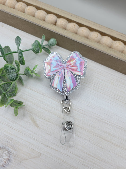 Holographic Pink Bow Badge Reel