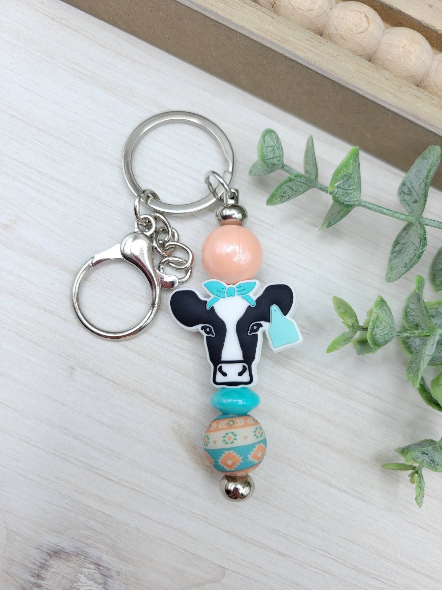 Turquoise Tails Barbell Keychain