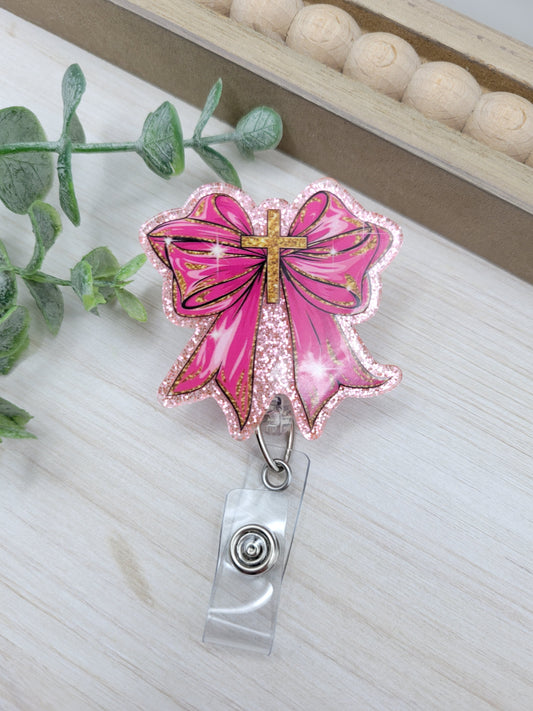 Pink Bow with Cross Badge Reel