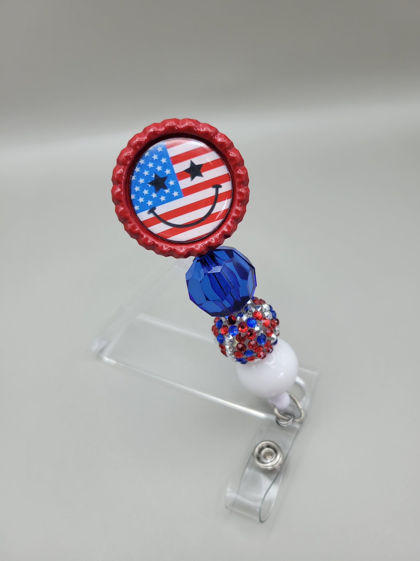 Red USA Smiley Badge Reel
