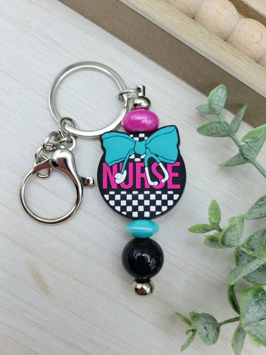 Nurse with Teal Bow Barbell Keychain