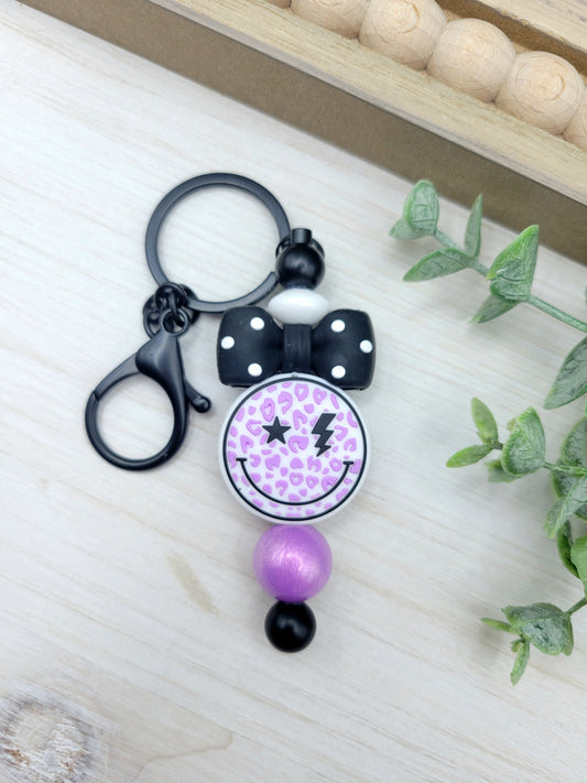 Purple Smiley Barbell Keychain